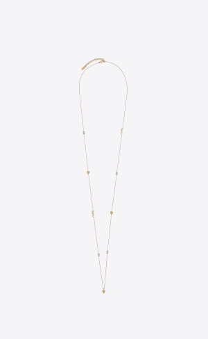 YSL Cassandre, Heart And Rhinestone Long Necklace In Metal Zlaté | 07296-OVMG